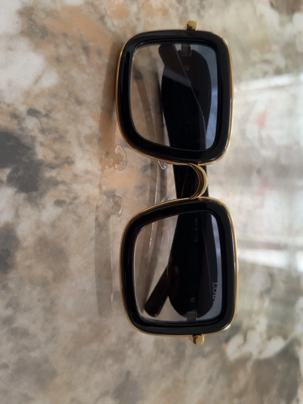 Loewe Black Sunglasses with Gold Accents and Gradient Lenses
